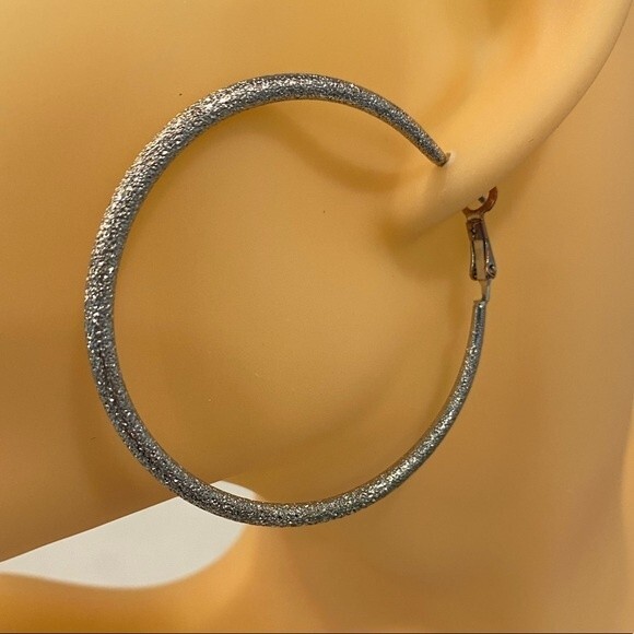 Silver Hoop Shimmer Earring’s 2” diameter Spring back closure - Picture 8 of 9